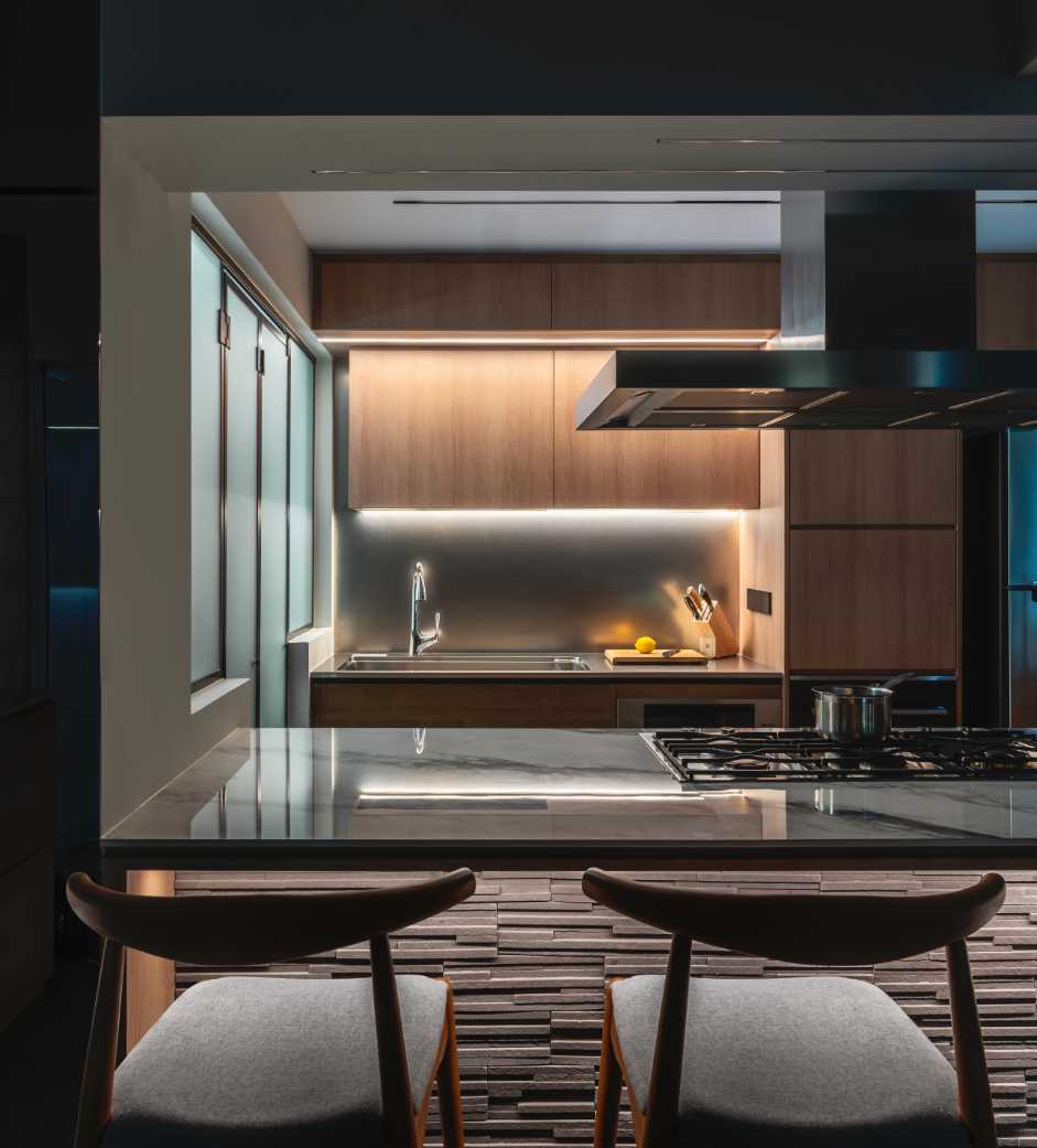 Industrial Kitchen with Feature Wall and Dining Table