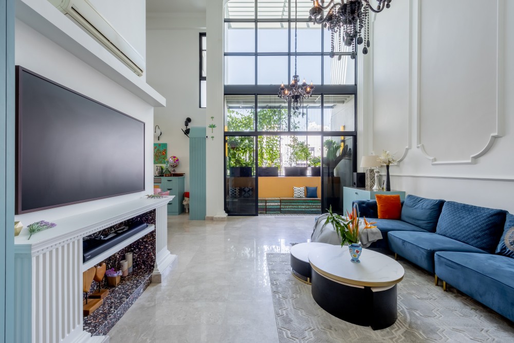 Eclectic Living Room with Feature Wall and Chandelier