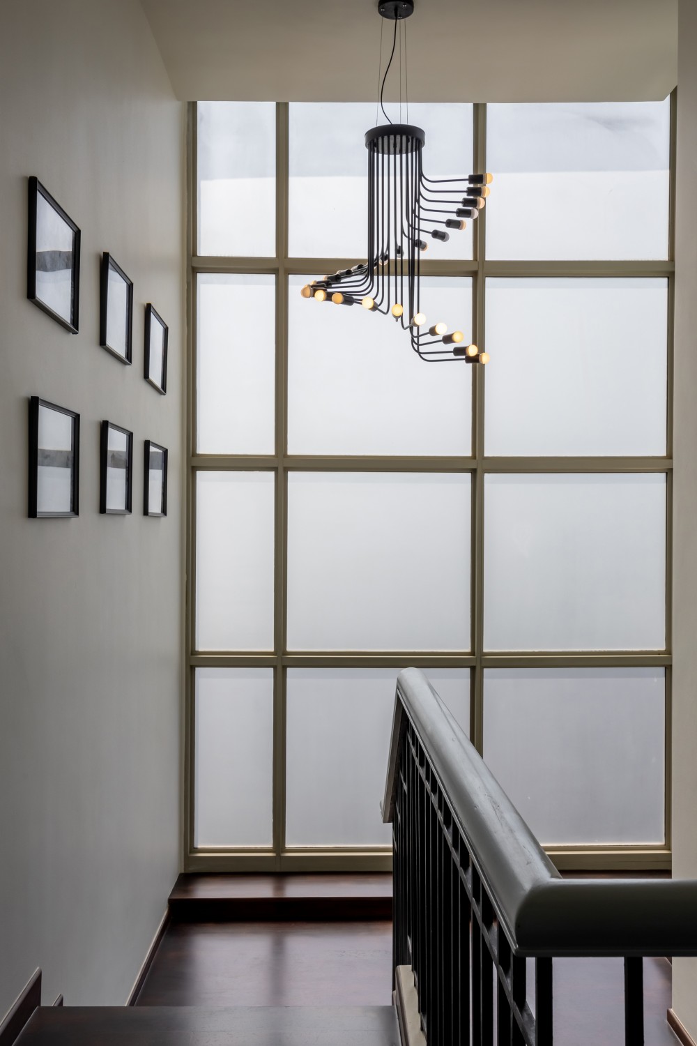 Eclectic Hallway with Artwork and Paintings