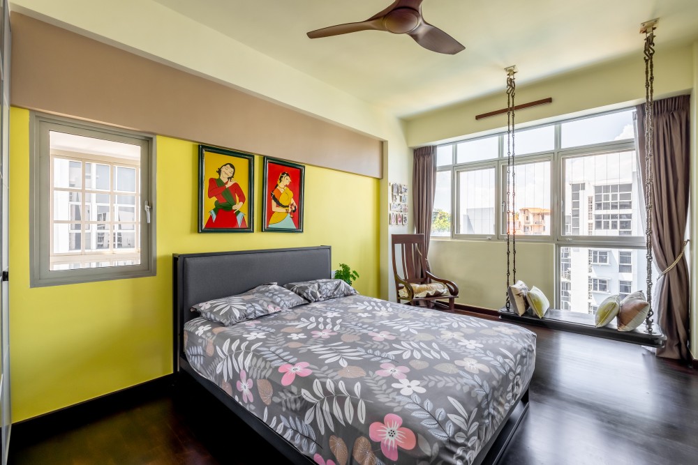 Eclectic Bedroom with Feature Wall and Ceiling Fan