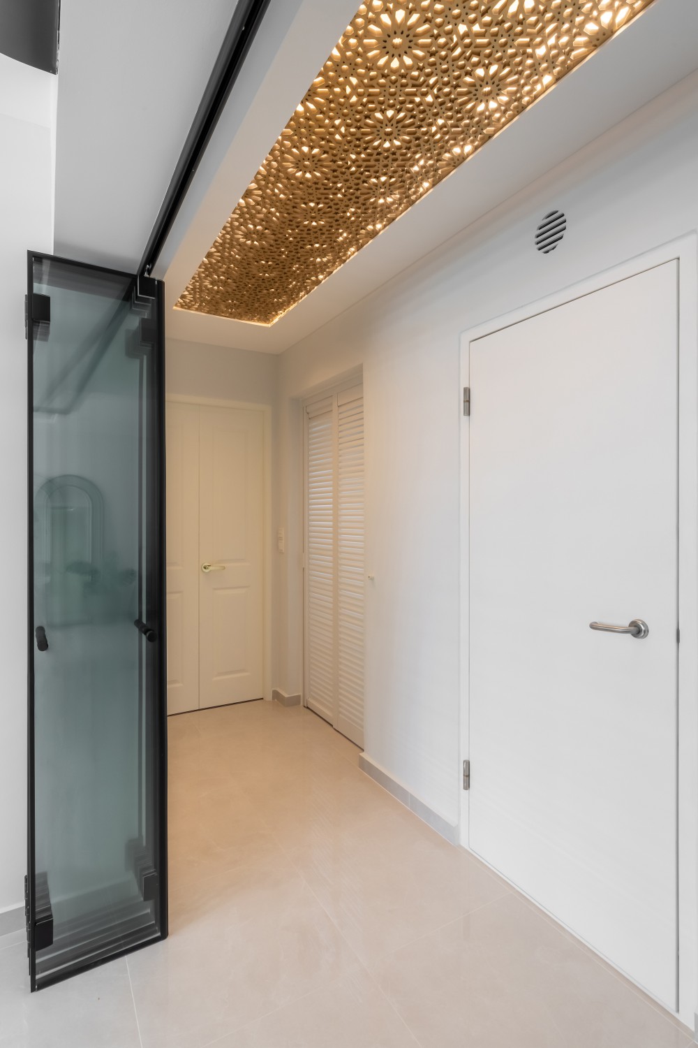 Contemporary Entryway with Feature Wall and Ceiling Light