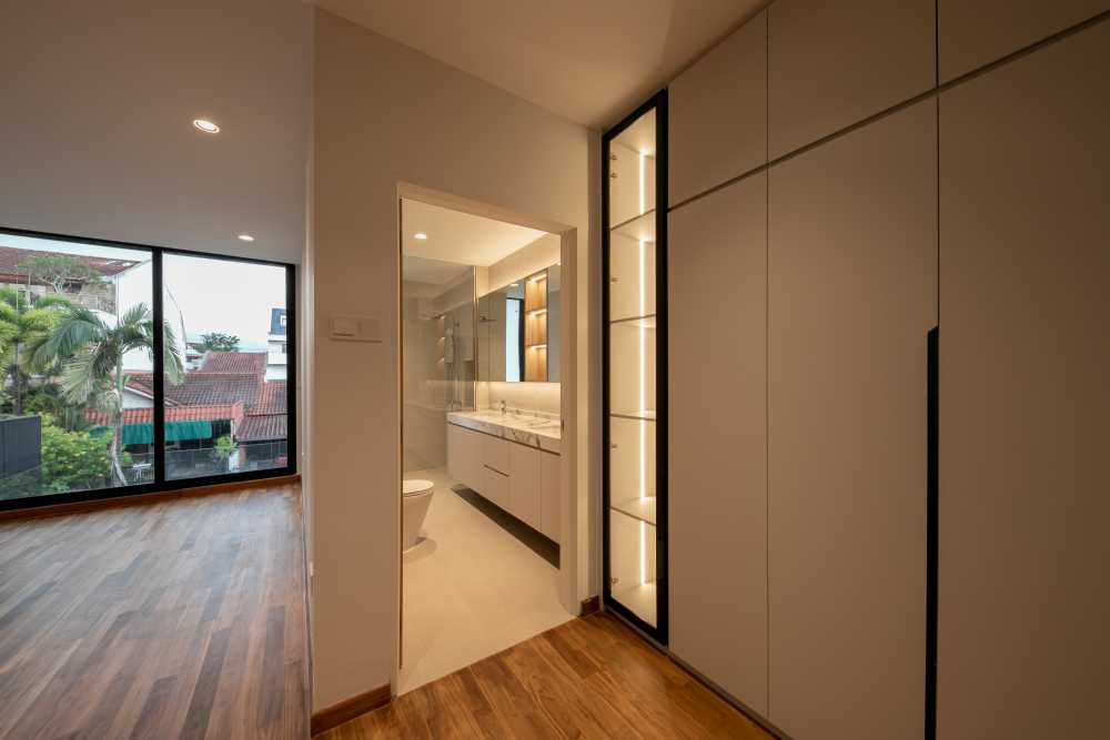 Minimalist Bedroom with Parquet Floor and Ceiling Light