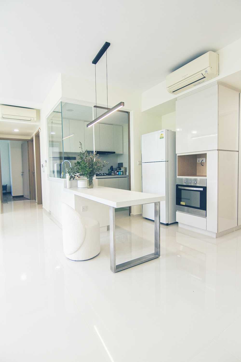Minimalist Dining Room with Drop Light and Kitchen Island
