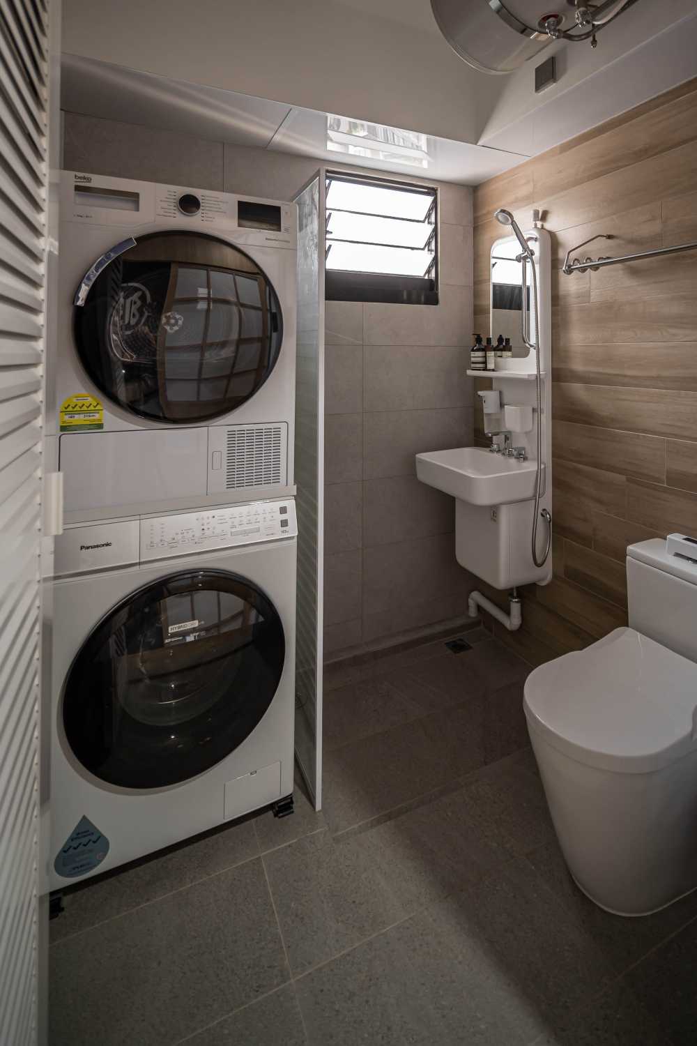 Asian Bathroom with Washing Machine and Laundry Area