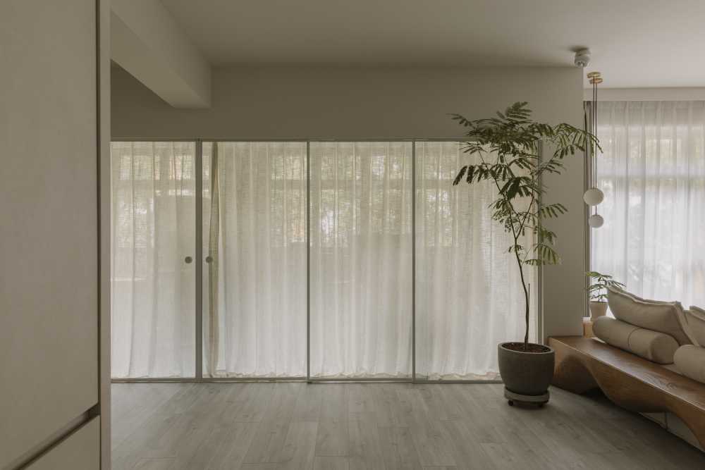 Minimalist Home Office with Curtain and Sofa