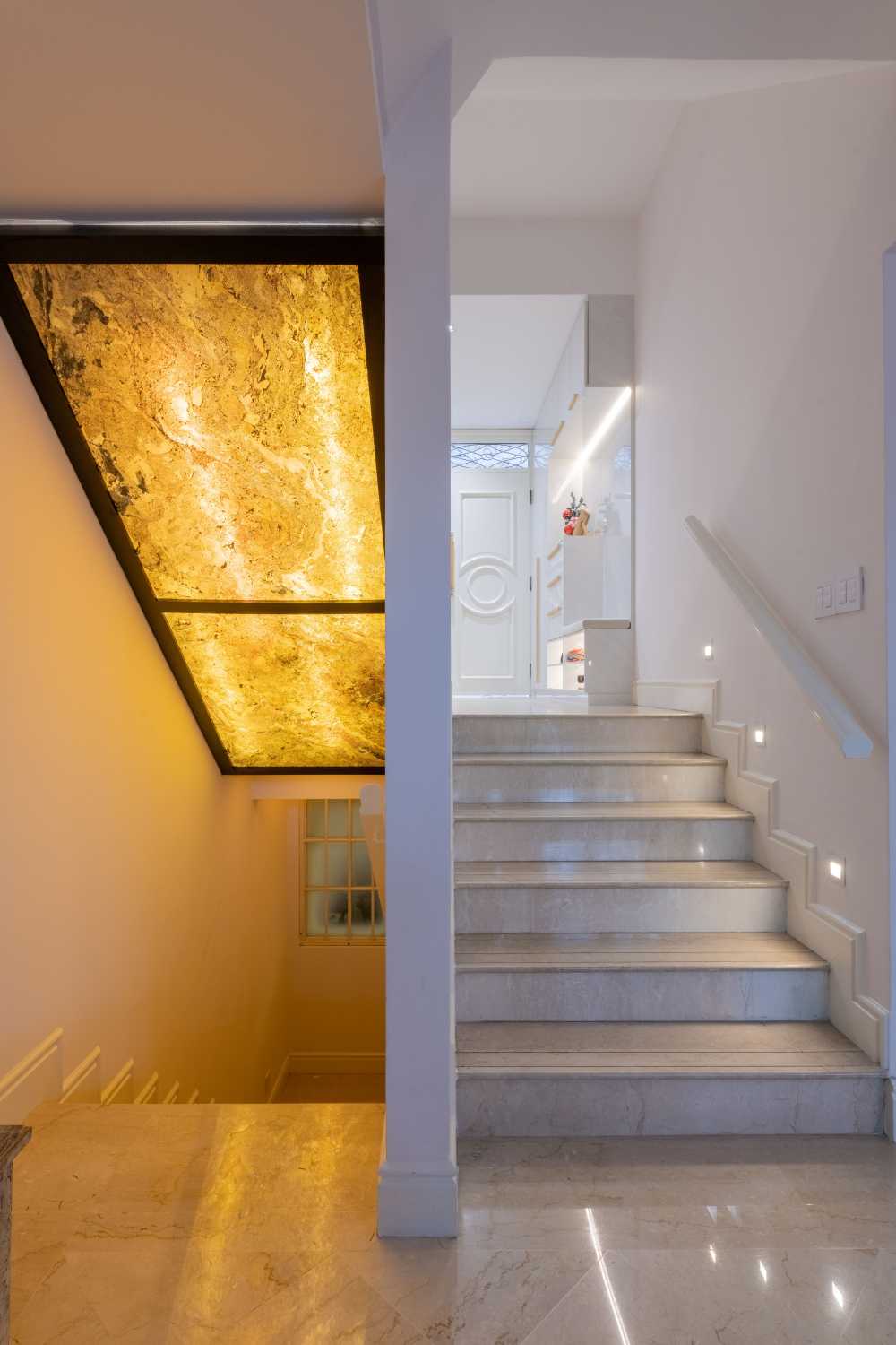 Modern Hallway with Bookshelf and Artwork