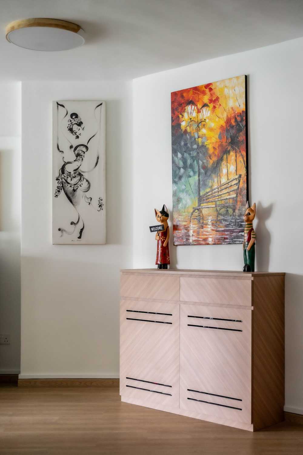 Scandinavian Living Room with Vinyl Flooring and Paintings
