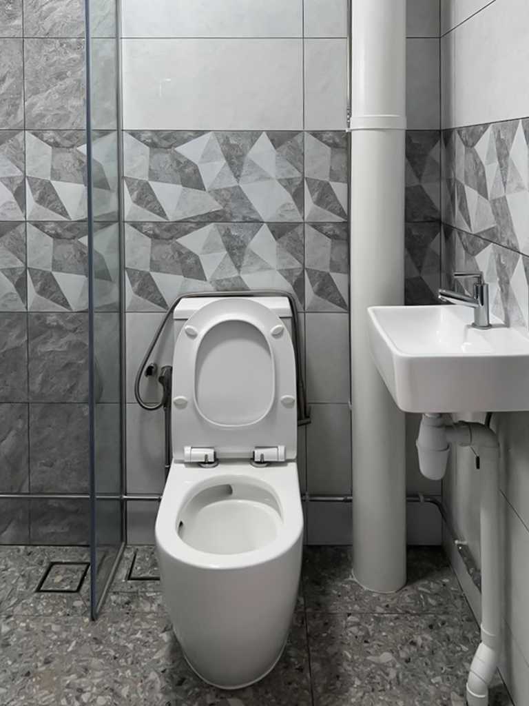 Scandinavian Bathroom with Paintings and Bathroom Sinks
