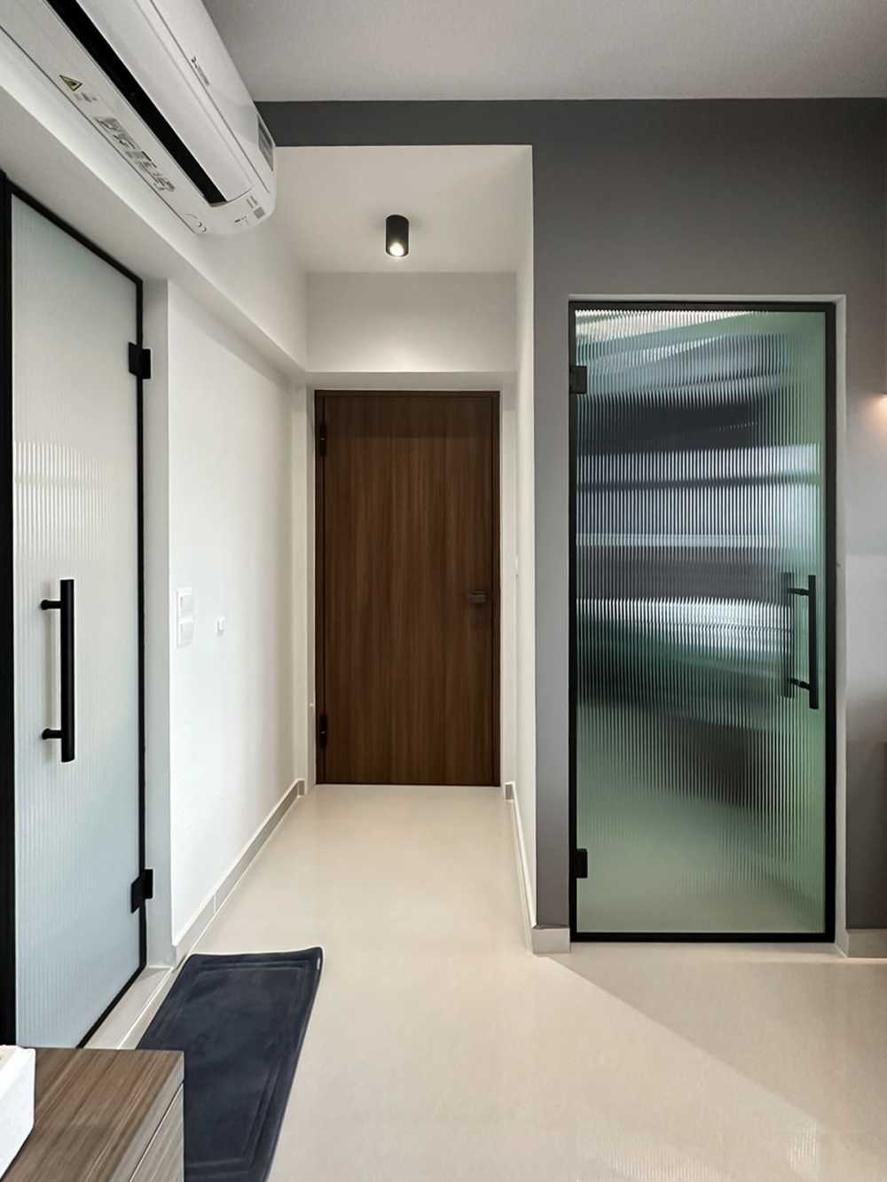 Scandinavian Bedroom with Glass Door and Paintings