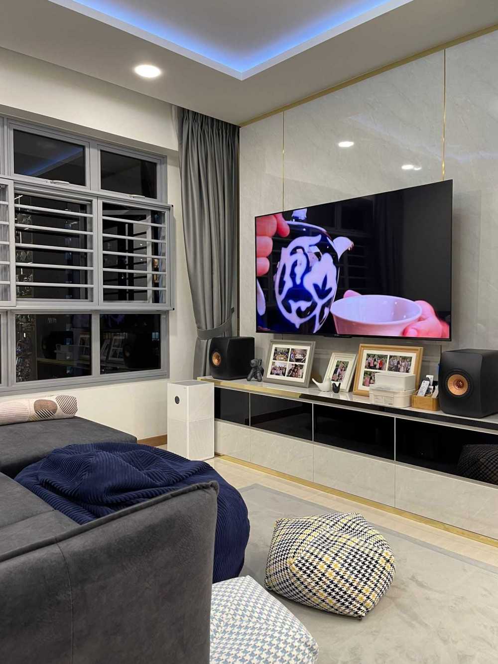 Modern Living Room with Homogeneous Tiles and TV Console