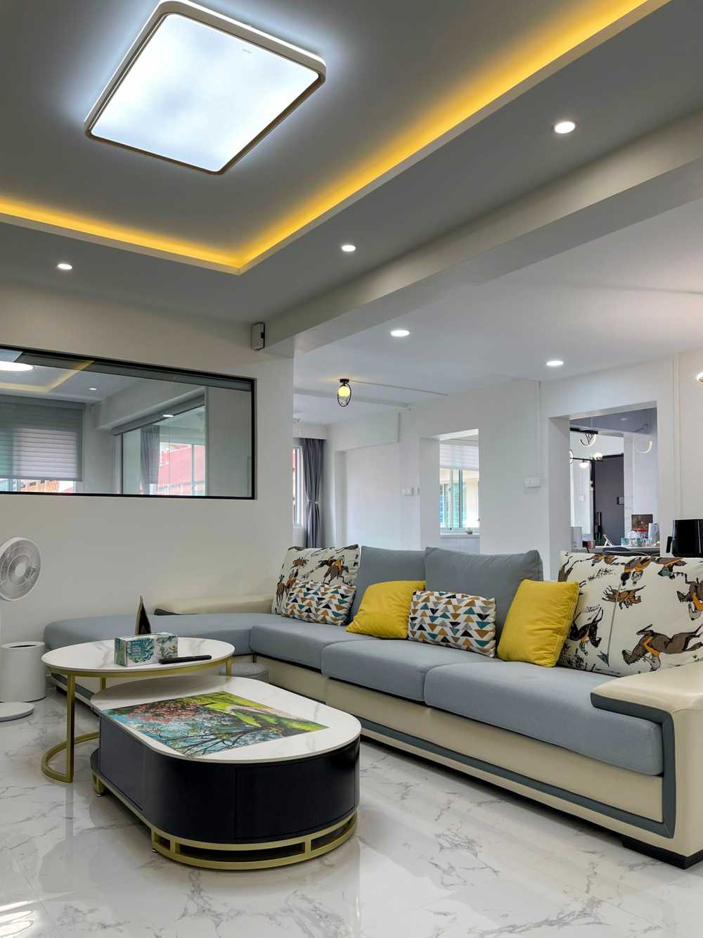 Modern Living Room with Cove Lighting and Ceiling Light