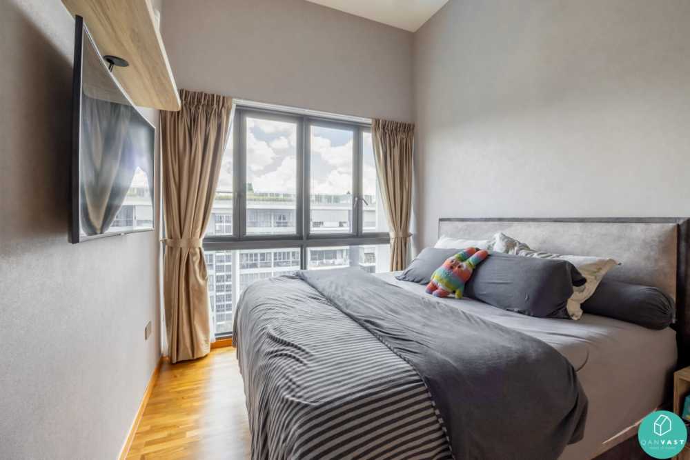 Modern Bedroom with Wood Flooring and Ceiling Light