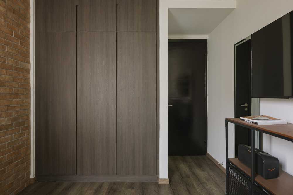Industrial Bedroom with Vinyl Flooring and Feature Wall