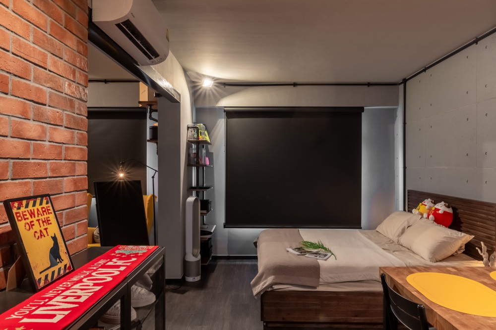 Industrial Bedroom with Vinyl Flooring and Feature Wall