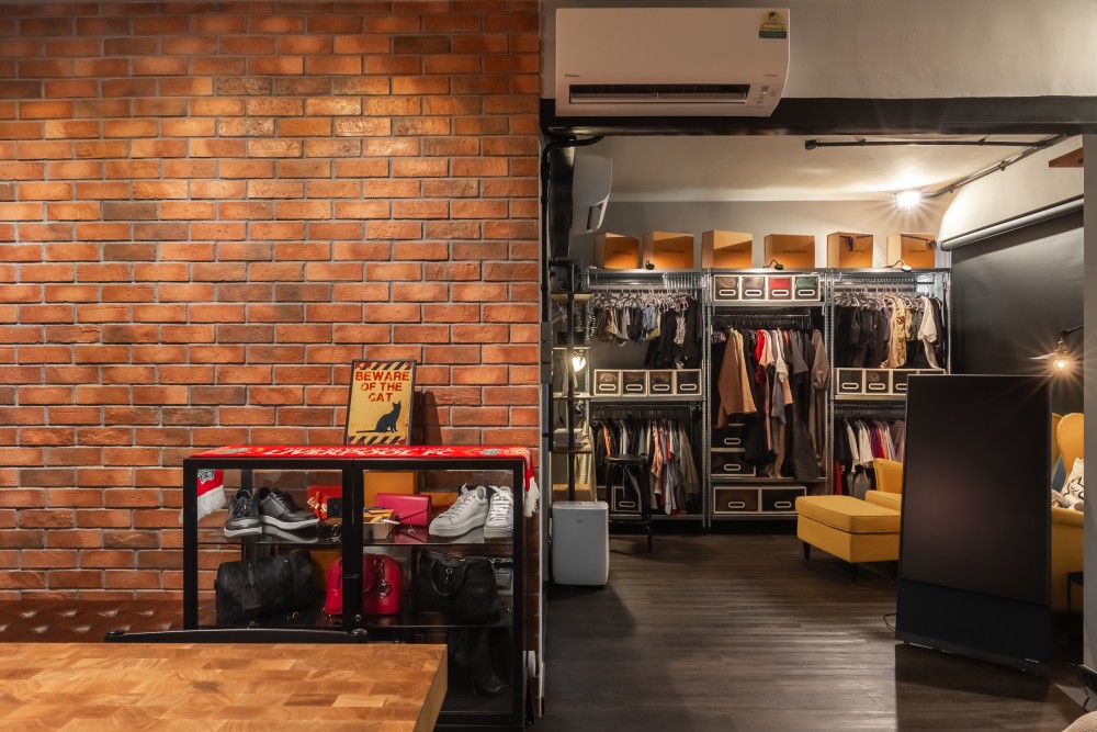 Industrial Bedroom with Vinyl Flooring and Feature Wall
