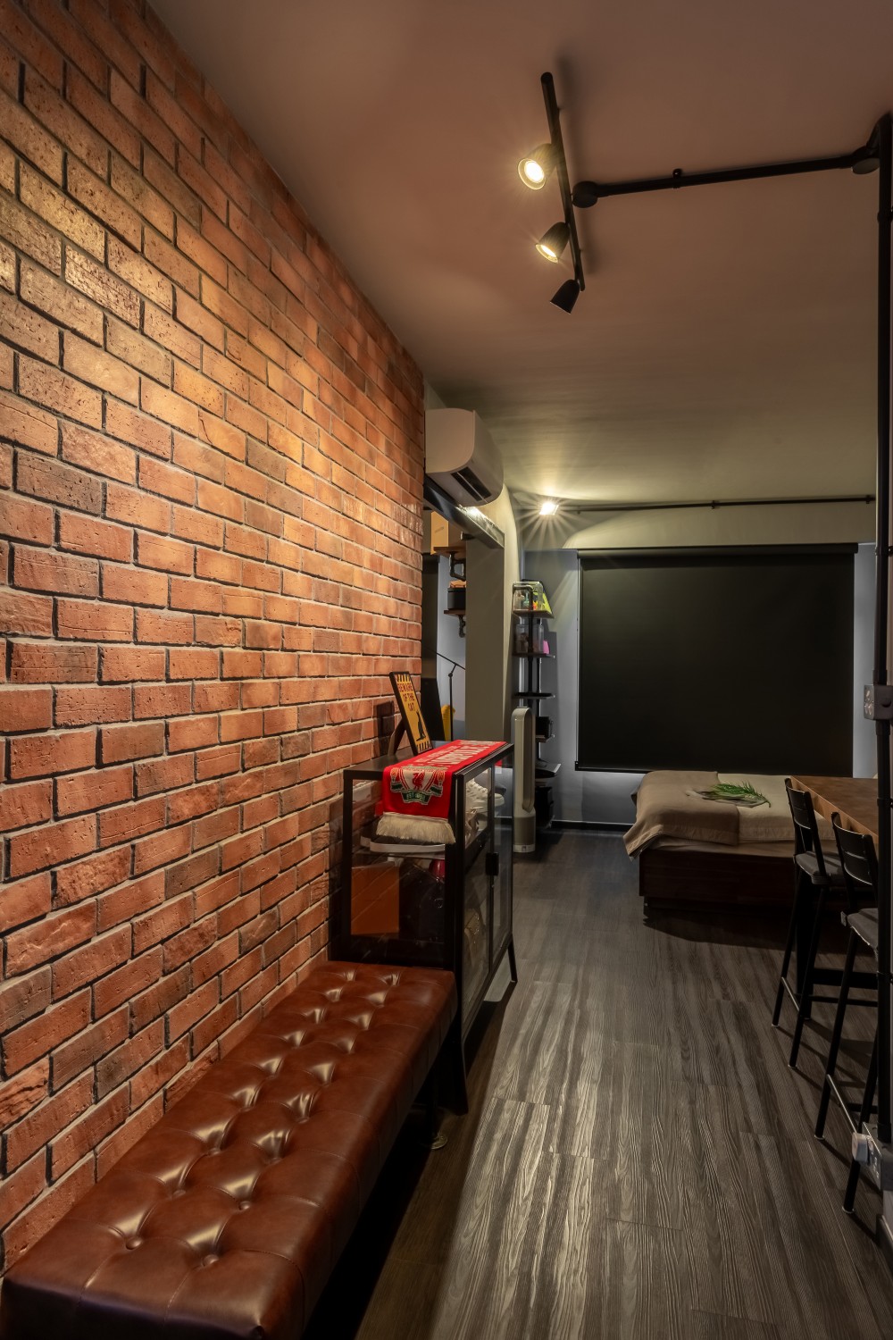 Industrial Bedroom with Vinyl Flooring and Feature Wall