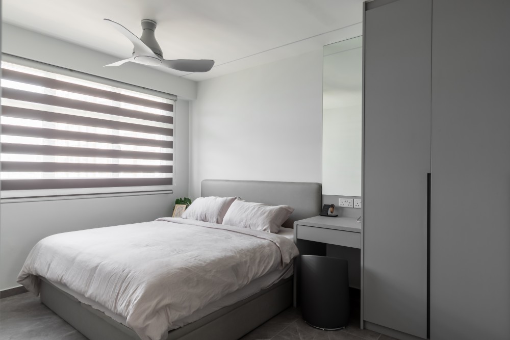 Minimalist Bedroom with Homogeneous Tiles and Wardrobe