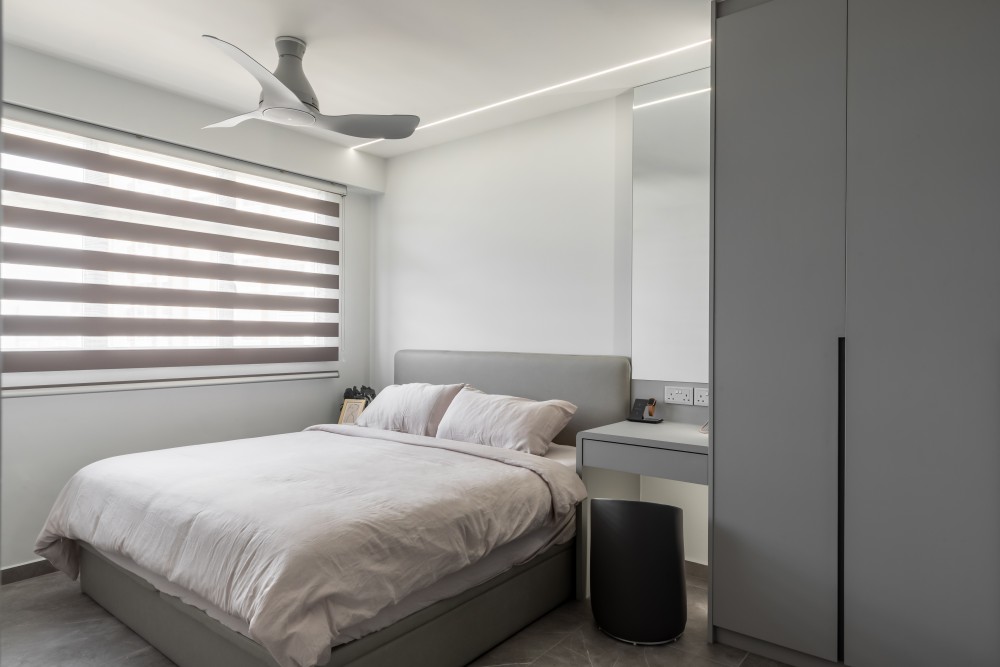 Minimalist Bedroom with Homogeneous Tiles and Wardrobe
