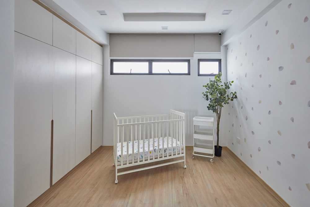 Scandinavian Bedroom with Wardrobe and Paintings