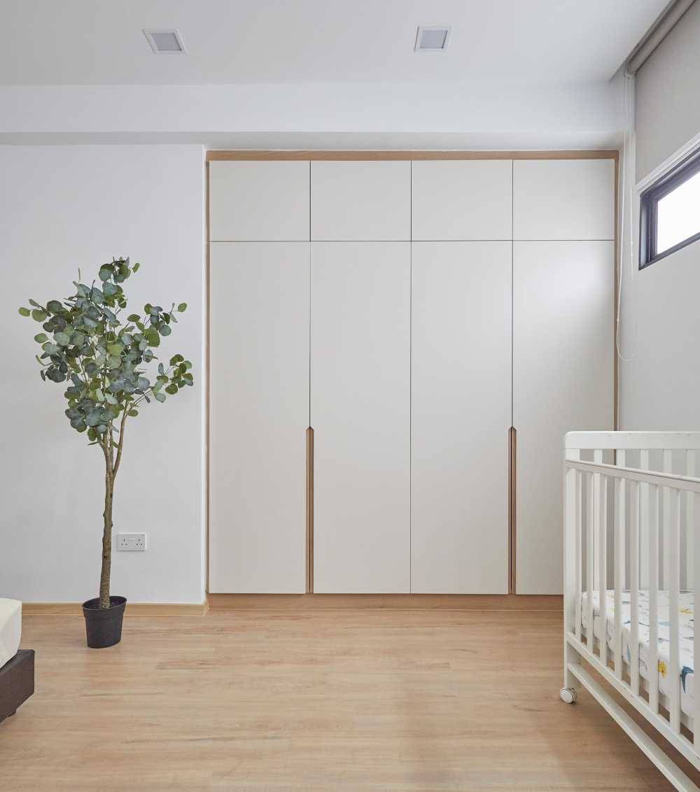 Scandinavian Bedroom with Wardrobe and Paintings
