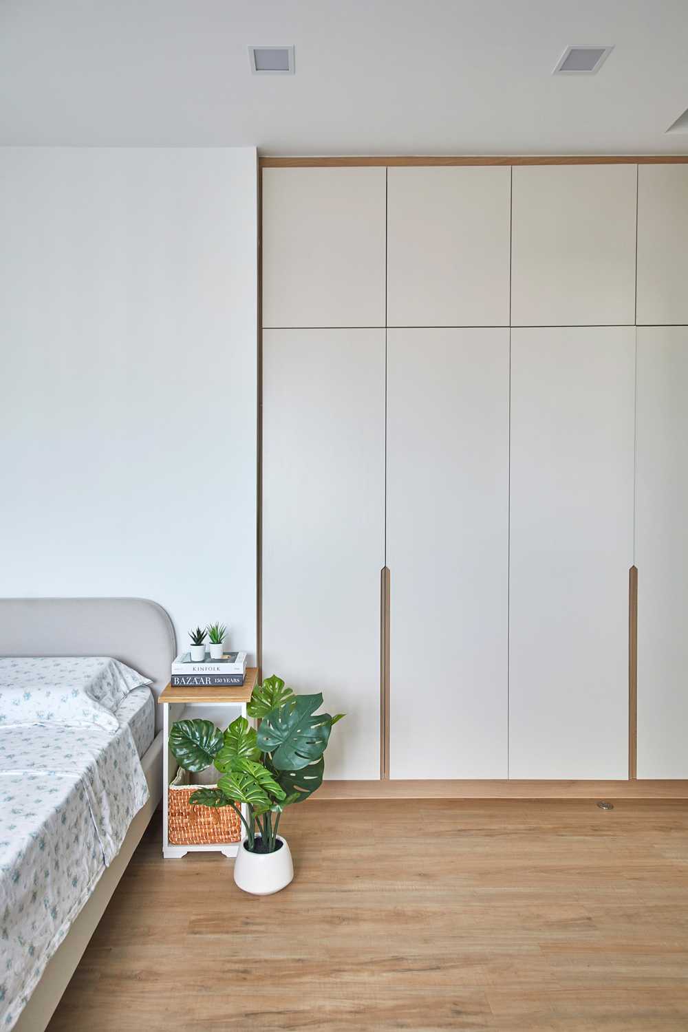 Scandinavian Bedroom with Wardrobe and Paintings