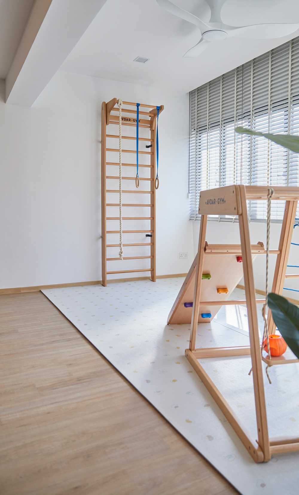 Scandinavian Gaming Room with Window Grille and Paintings