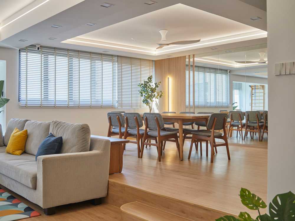 Scandinavian Dining Room with Mirror and Window Grille