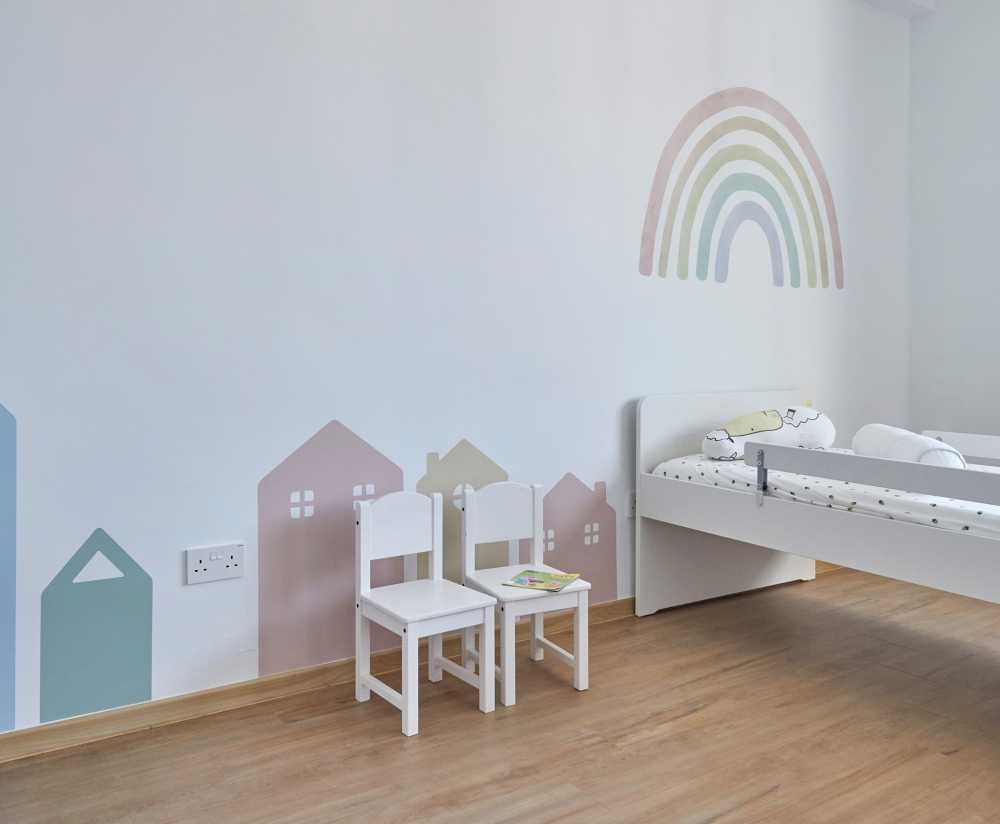 Scandinavian Kids Room with Paintings and Children's Furniture