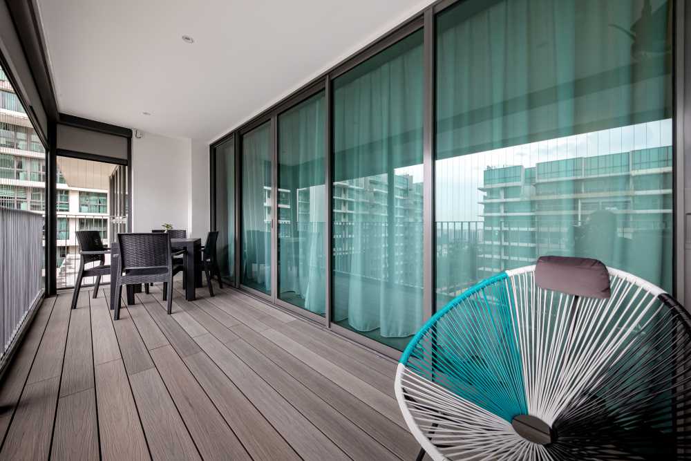 Modern Balcony with Window Grille and Outdoor Chairs