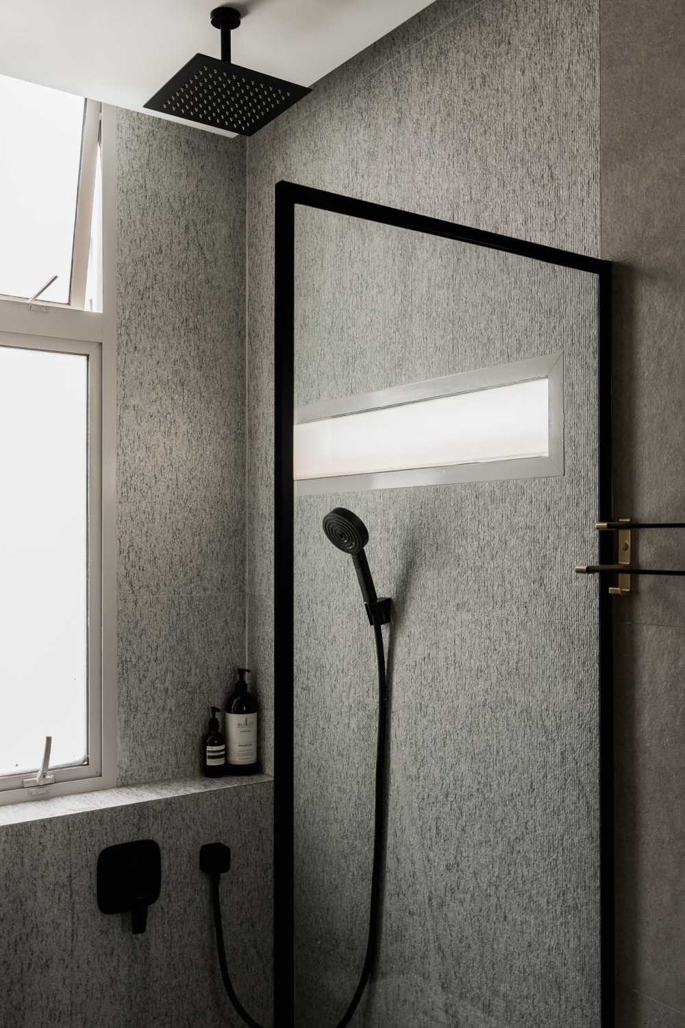 Minimalist Bathroom with Rainshower and Bathroom Storage