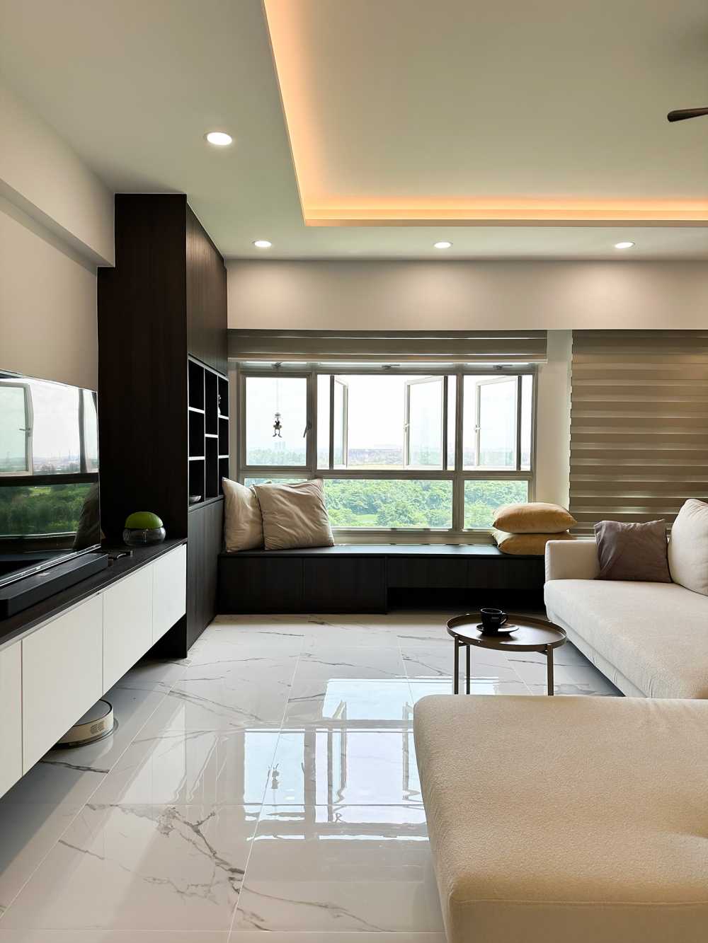 Scandinavian Living Room with TV Console and Window Seat
