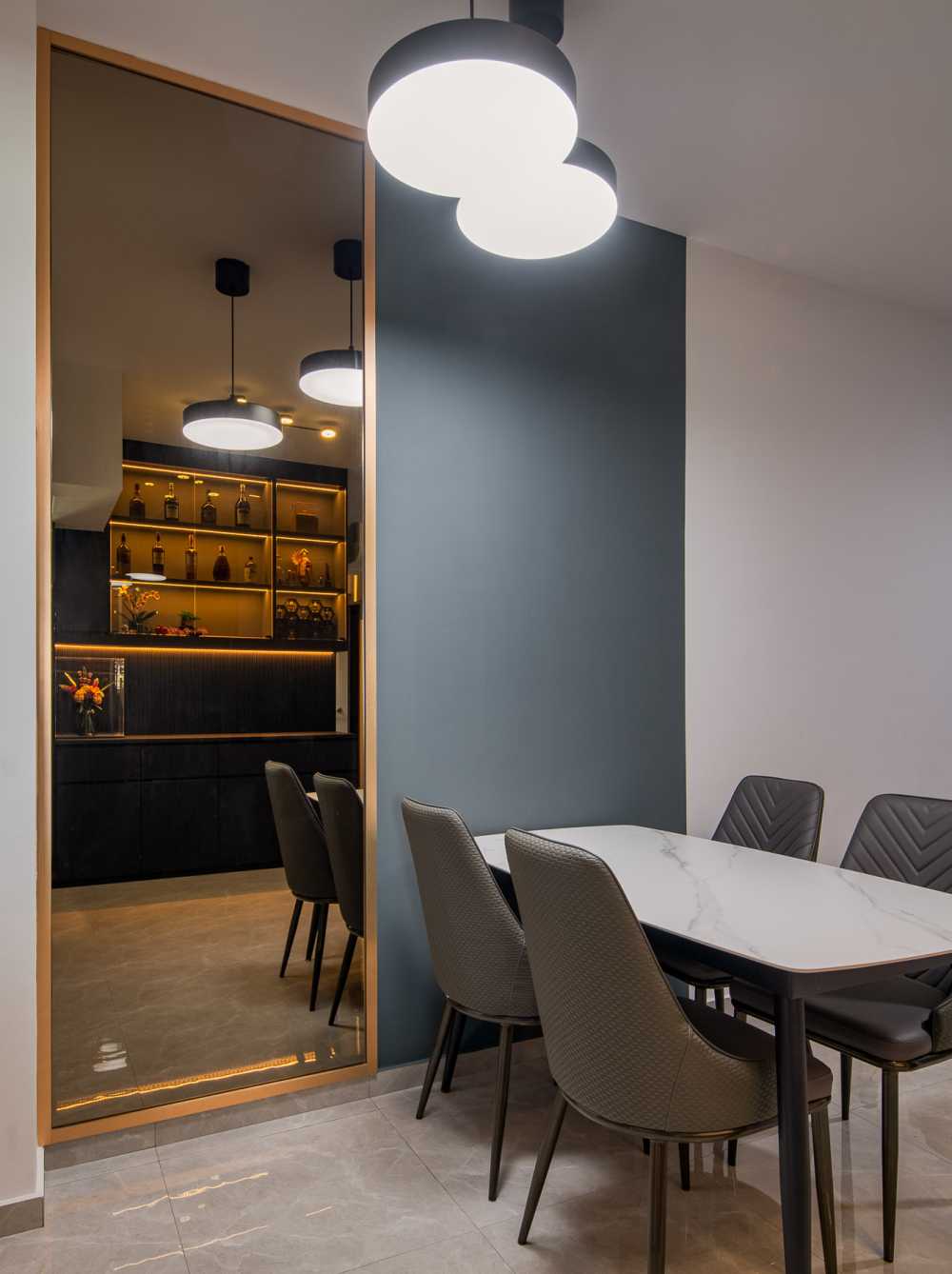 Contemporary Dining Room with Drop Light and Lighting