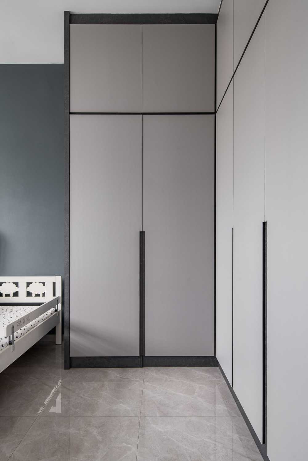 Contemporary Bedroom with Homogeneous Tiles and Wardrobe