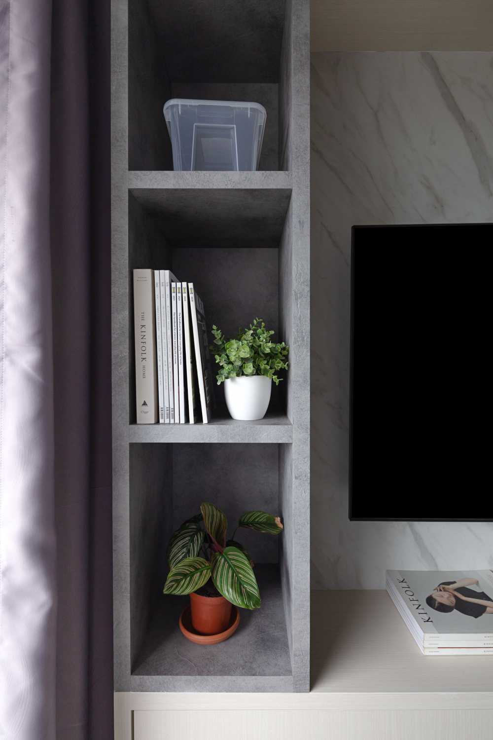 Contemporary Living Room with Bookshelf and Cement Floor