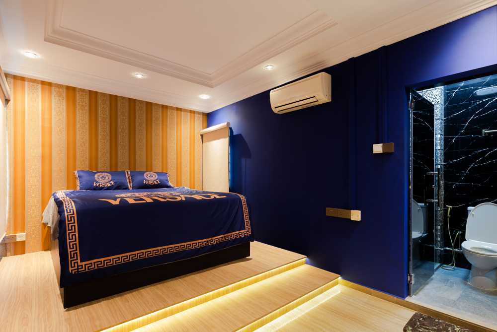 Vintage Bedroom with Wood Flooring and Drop Light