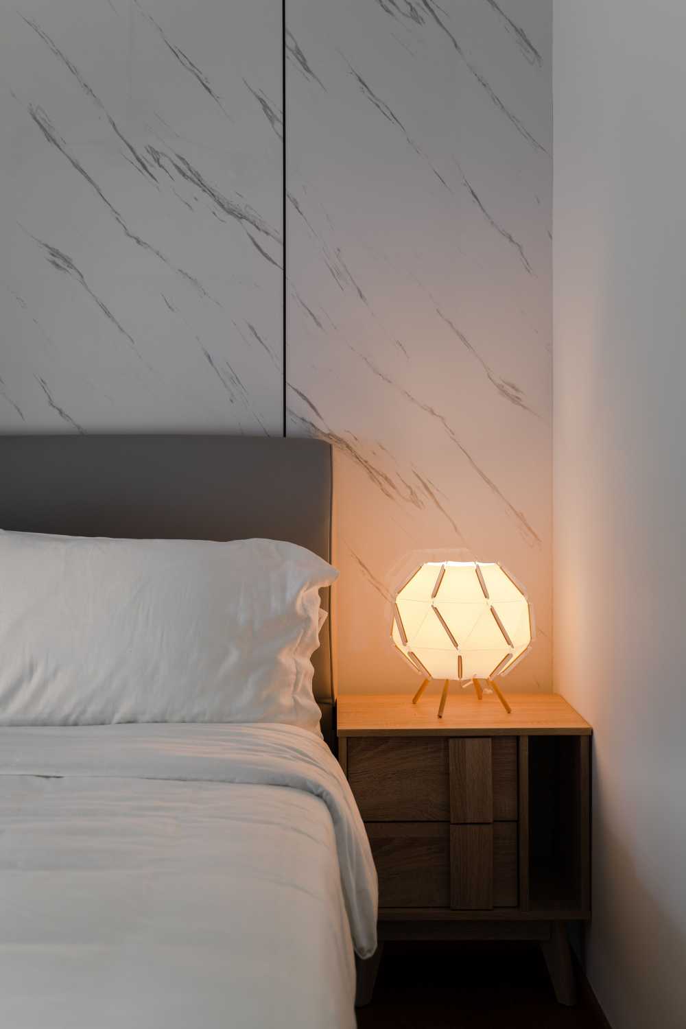 Contemporary Bedroom with Cement Floor and Wood Flooring