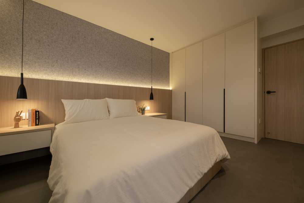 Minimalist Bedroom with Drop Light and Wardrobe