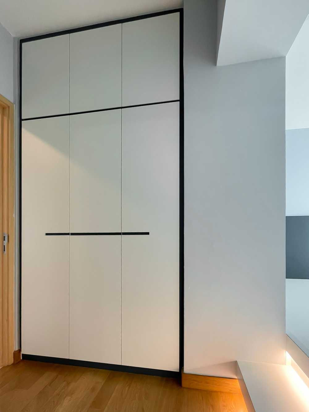 Scandinavian Bedroom with Wardrobe and Paintings