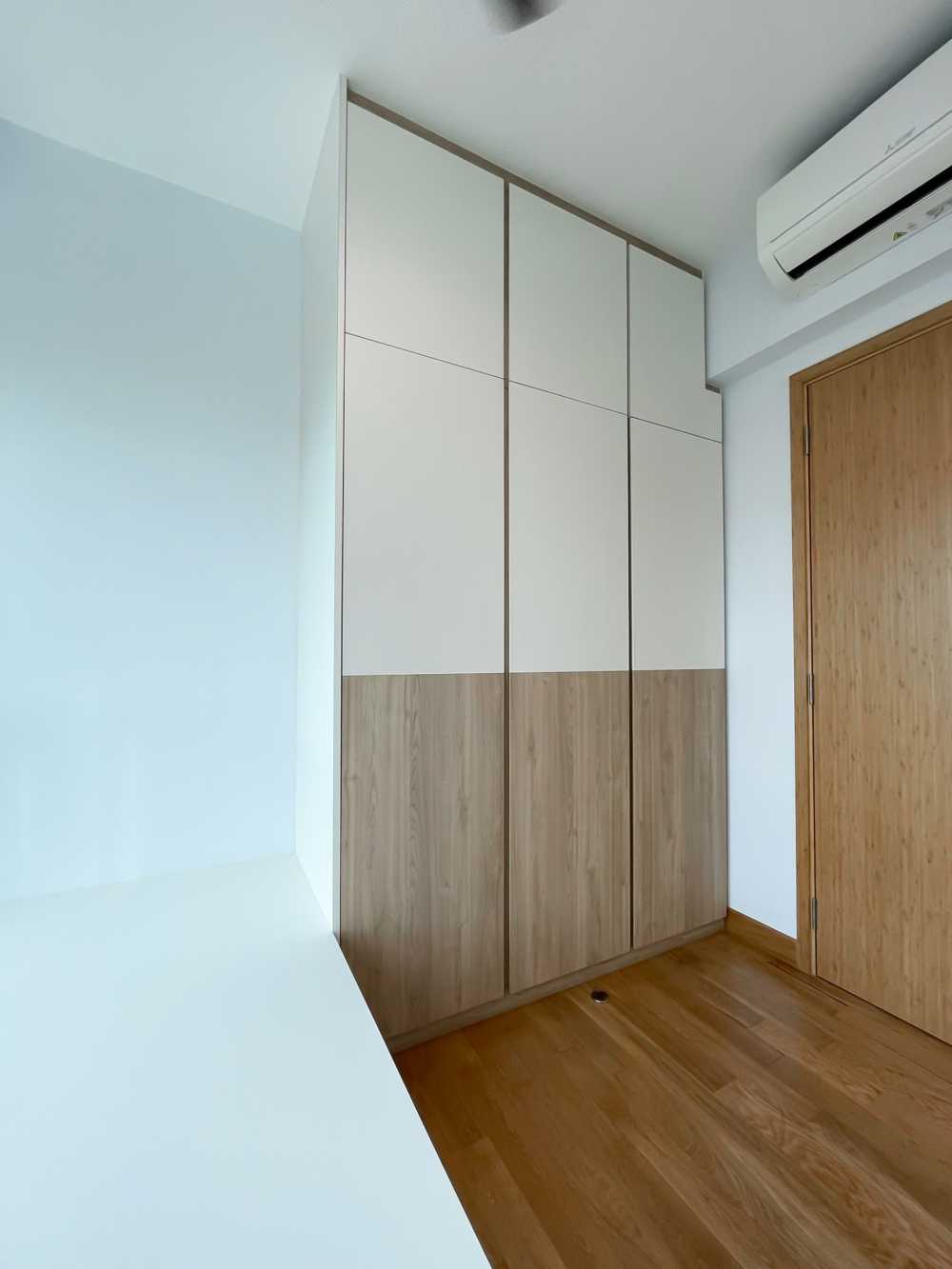 Scandinavian Bedroom with Wardrobe and Paintings