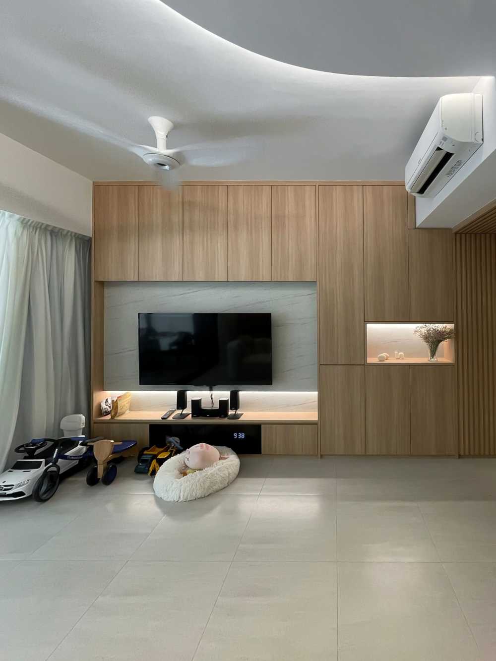Scandinavian Living Room with TV Console and Paintings