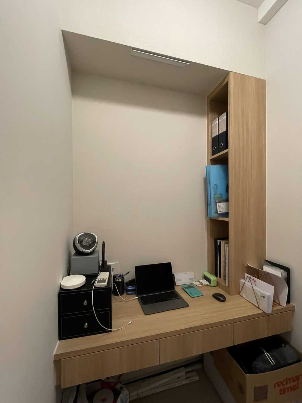 Scandinavian Home Office with Bookshelf and Paintings