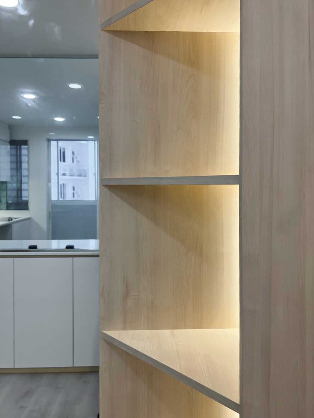 Scandinavian Foyer with Paintings and Storage Cabinets
