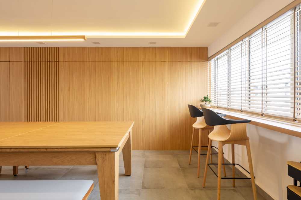 Scandinavian Living Room with Homogeneous Tiles and Feature Wall