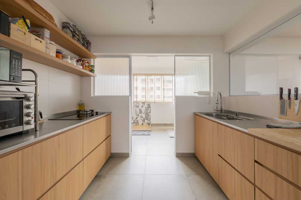 Scandinavian Kitchen with Homogeneous Tiles and Cement Floor