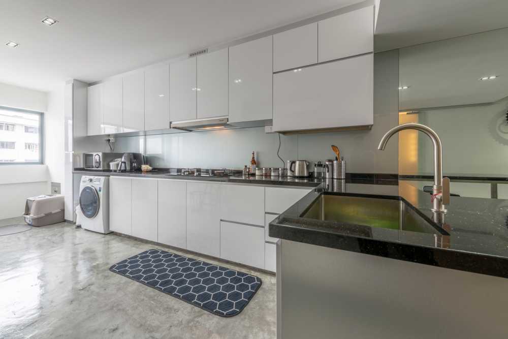 Industrial Kitchen with Countertop and Cement Floor