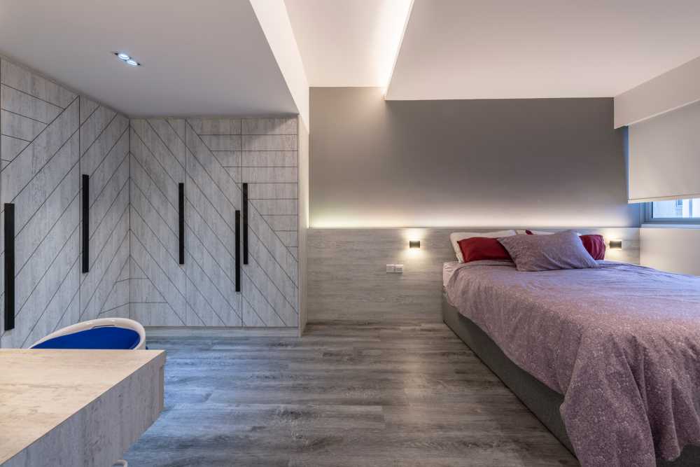 Industrial Bedroom with Vinyl Flooring and Drop Ceiling