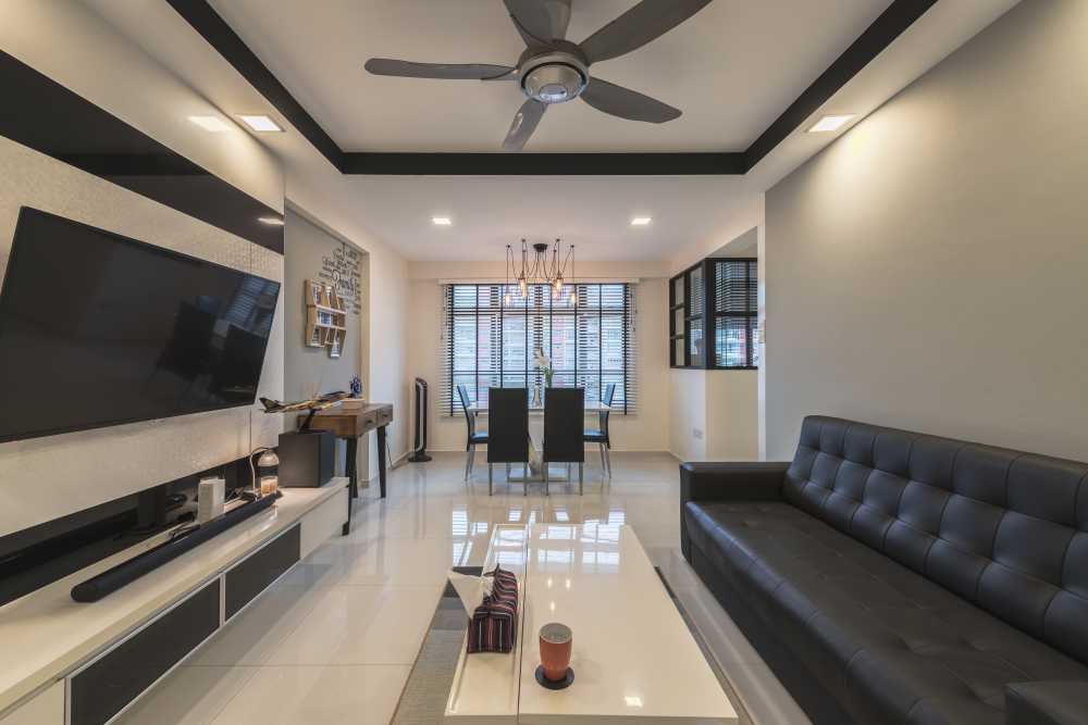 Modern Living Room with Homogeneous Tiles and Feature Wall