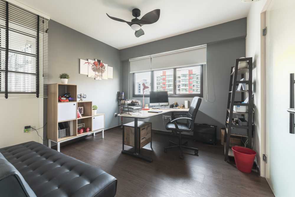 Modern Home Office with Bookshelf and Desk
