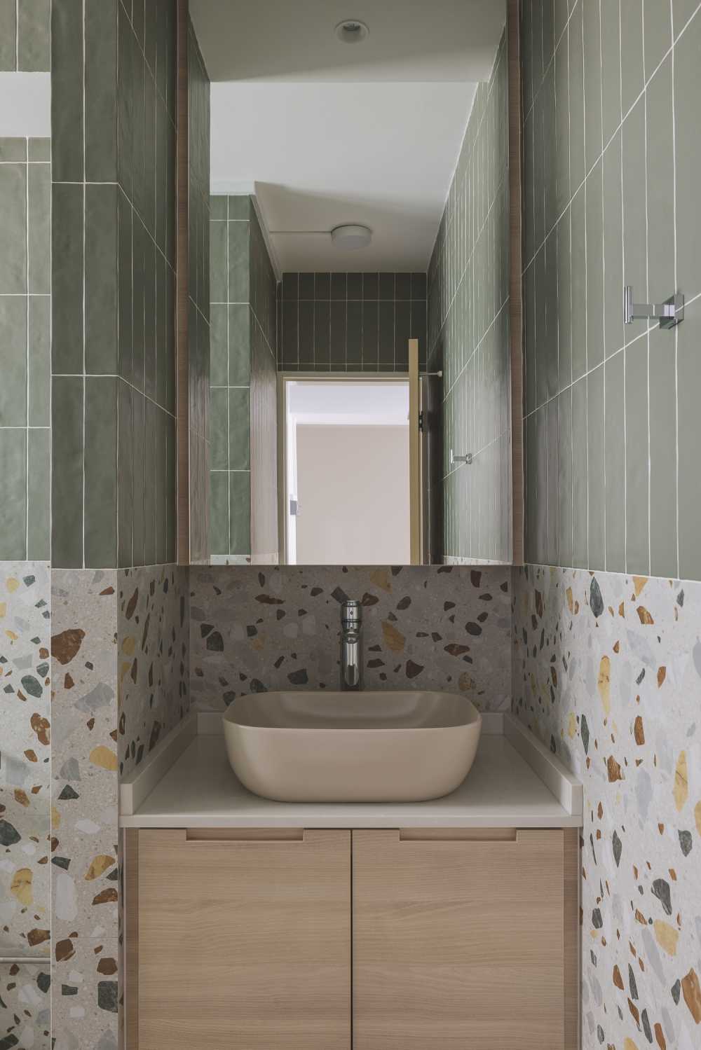 Modern Bathroom with Mirror and Green Wall