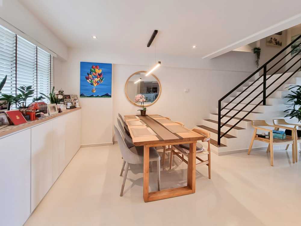 Scandinavian Dining Room with Window Shutters and Sideboard